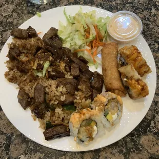 Wish I took more photos, this is after we dished it all up! Teriyaki steak. It was cooked medium. Delish!