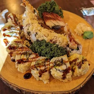 Left to right: Fried California roll, golden dragon roll, 2x unagi sashimi