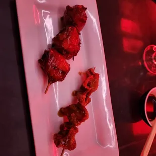 Robatayaki: bacon quail egg and chicken skin