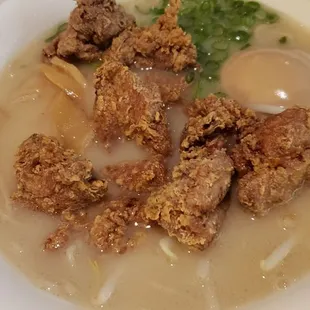 a close up of a bowl of ramen