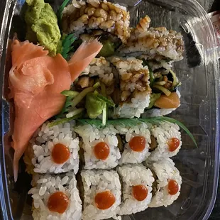 a close up of a container of sushi