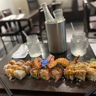 a table with a variety of sushi