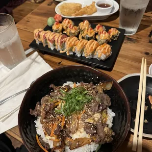 Bulgogi-Don with Double Spicy sushi and Volcano sushi.