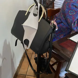 I just loved the fact that each table had these hangers for jackets or purses or masks lol