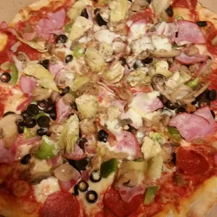 Supreme pizza with artichoke hearts, GOOD!