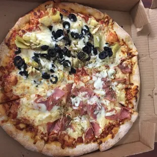 2 topping large "pizza special", black olive &amp; artichoke, canadian bacon &amp; pineapple.  mon., tues., &amp; wed., for $8.50.  tree b.