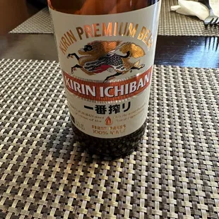 a bottle of beer on a table