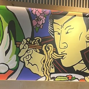a woman eating ramen