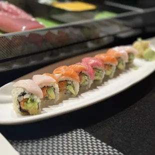 Big Toro - bluefin tuna, salmon, and yellowtail toro (belly) on top of a spicy, crunchy tuna-avocado-cucumber roll