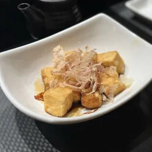 Age Tofu - fried tofu, served in a soy-dashi sauce, topped with bonito flakes