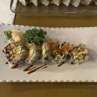 Shrimp Tempura Roll (bottom) I forgot but some special spicy tuna roll (top)