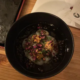 salad with ikura, scallop, truffle oil, uni, and flower petals