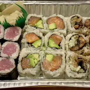 Tuna roll, salmon avocado roll, eel cucumber roll. Takeout sushi
