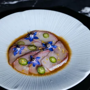 a plate of raw fish