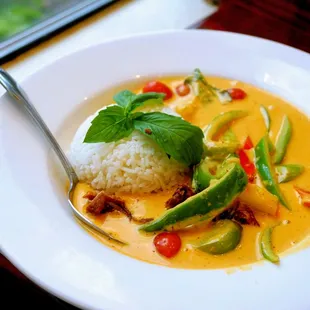 Roasted Duck Curry: roasted duck with coconut milk red curry, pineapple, cherry tomatoes, bell peppers and basil ($16).