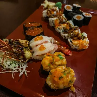 Ikura, Amaebi, spicy scallop, Spider roll, and Salmon Roll