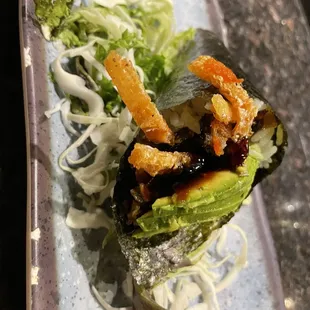 Salmon skin avocado hand roll