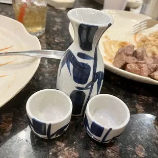 a table with dishes and utensils