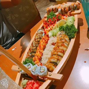 This was a sushi boat containing all the rolls we ordered plus a little extra special from the sushi bar!