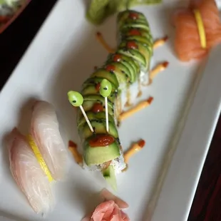 Red snapper nigiri, Caterpillar roll, and Salmon nigiri