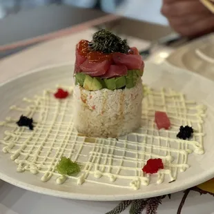 a plate of sushi on a table