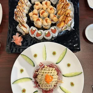 Top plate- Left: yummy  middle: rock &amp; roll Right: lion king  Top/bottom: spicy tuna add cream cheese Bottom plate: Dragon Ball