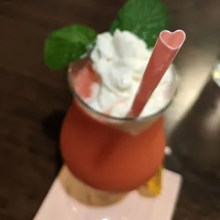 Virgin strawberry daiquiri with adorable heart straw