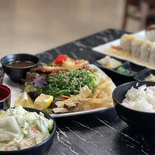 Salmon Skin Salad, Chirashi Bowl, California Deluxe plus one other very delicious roll.