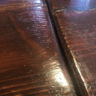 Food in the cracks, dirty table