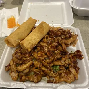 a meal in a styrofoam container