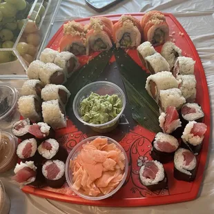 A variety of sushi..smoked salmon, tuna, and Volcano.