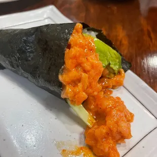 a close up of a sushi roll on a plate