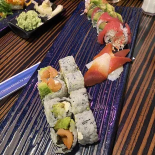 Rainbow rolls and Philadelphia rolls. Surf clam sashimi