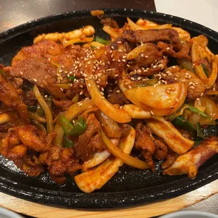 closer look spicy squid + pork belly stir fry