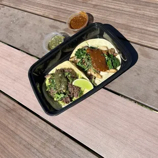 Barbacoa taco and mushroom kale taco