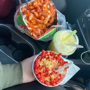 a person holding a plate of food