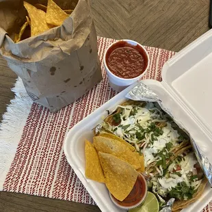 Al Pastor tacos (with everything on them) with chips and salsa. Wife says these are the best al pastor tacos she has ever had in her life.