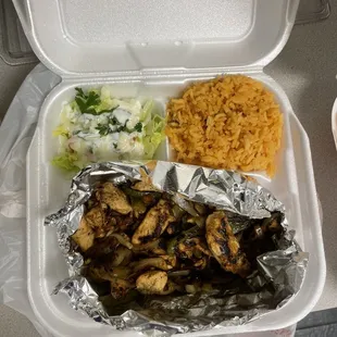 Chicken Fajitas with toppings and rice