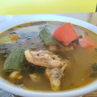 For you non Salvies put tortilla inside soup.  Piece by piece don't burn your fingers.