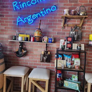 a brick wall with a neon sign