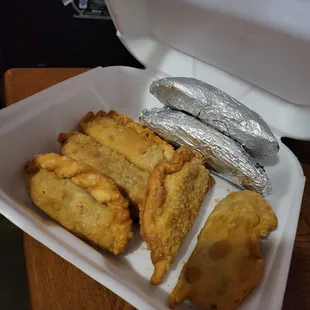 Beef empanada and queso empanada with tamales....