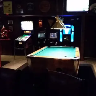 a pool table in a bar