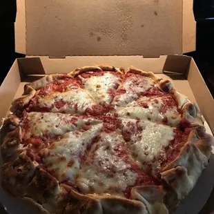 a pizza in a pizza box
