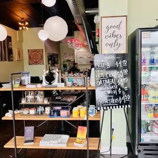 a refrigerator and a sign that says good things only