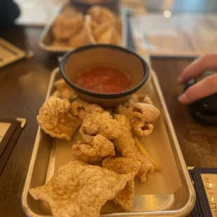 Pork grinds and salsa