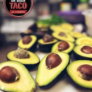 sliced avocados on a cutting board