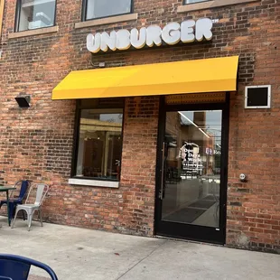 Back entrance from parking and outdoor seating.