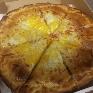 a cheese pizza in a box