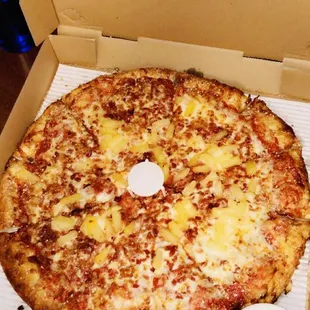 Monday/ Tuesday $7.99 large 1 topping pizza special - pineapple  and bacon  with seasoned crust