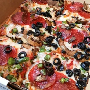 pepperoni, mushrooms, and olives